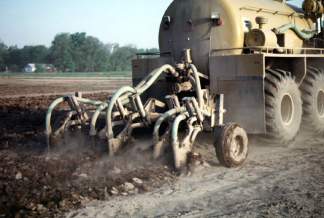 Slurry Manure being Injected Below the Soil Surface