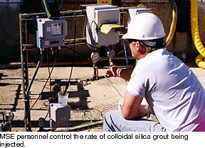 MSE personnel control the rate of colloidal silica grout being injected.