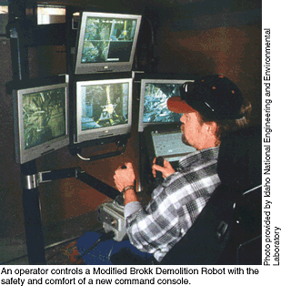 An operator controls a Modified Brokk Demolition Robot with the safety and comfort of a new command console.