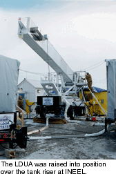 The LDUA was raised into position above the tank riser at INEEL.