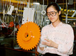 Intern inspecting part